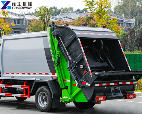 small trash compactor truck